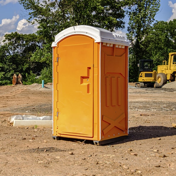 how often are the portable restrooms cleaned and serviced during a rental period in Center Ossipee